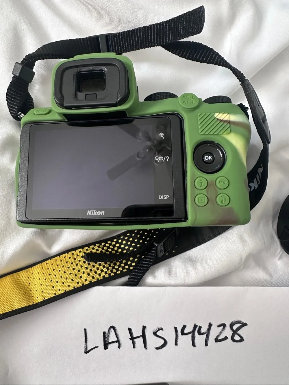 Nikon Digital Camera Body with Green Camo Skin and Yellow Nikon Strap